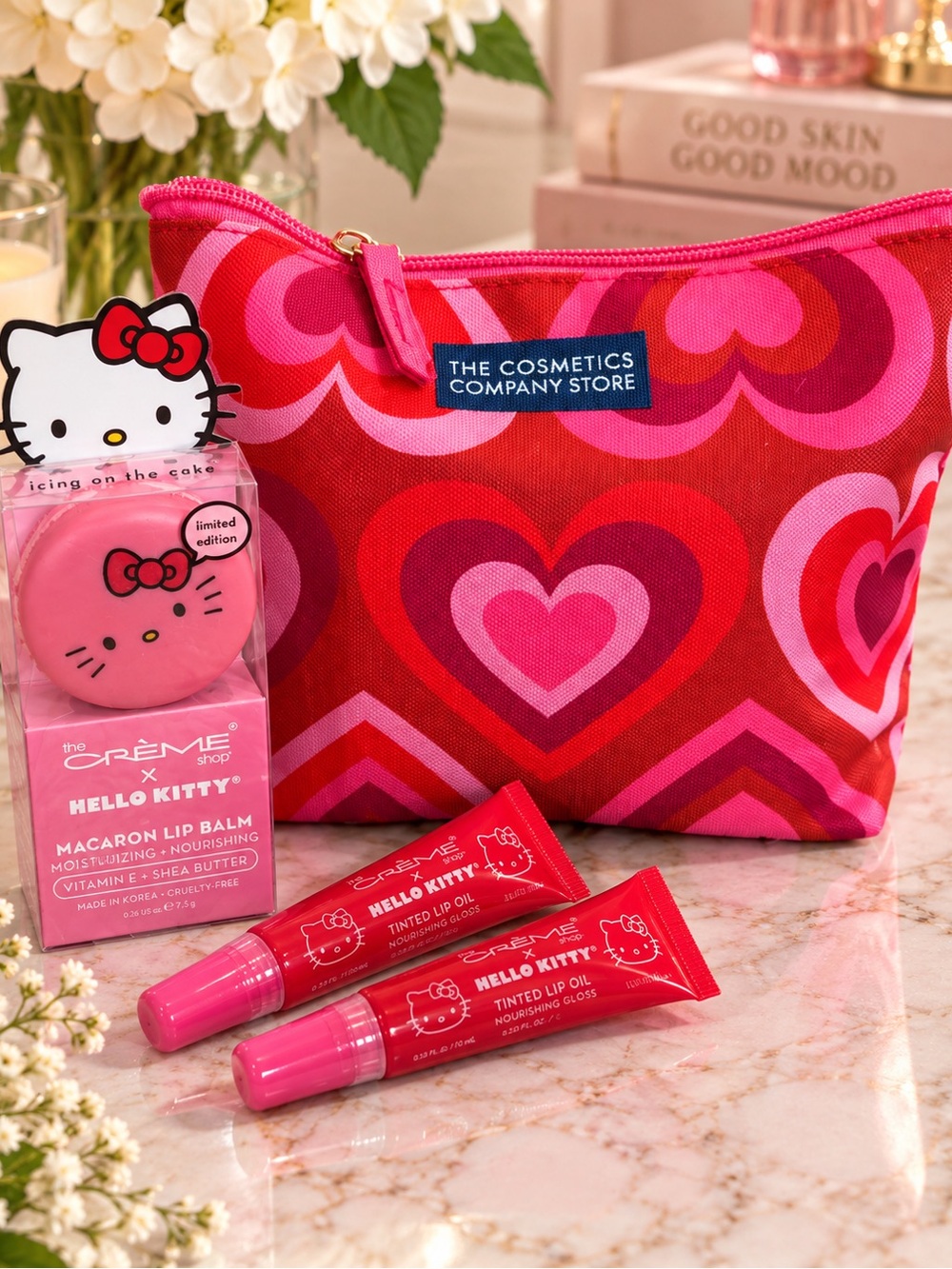 Hello Kitty Macaron Lip Balm + Aquafina Lip Oil Duo & Heart Cosmetic Bag